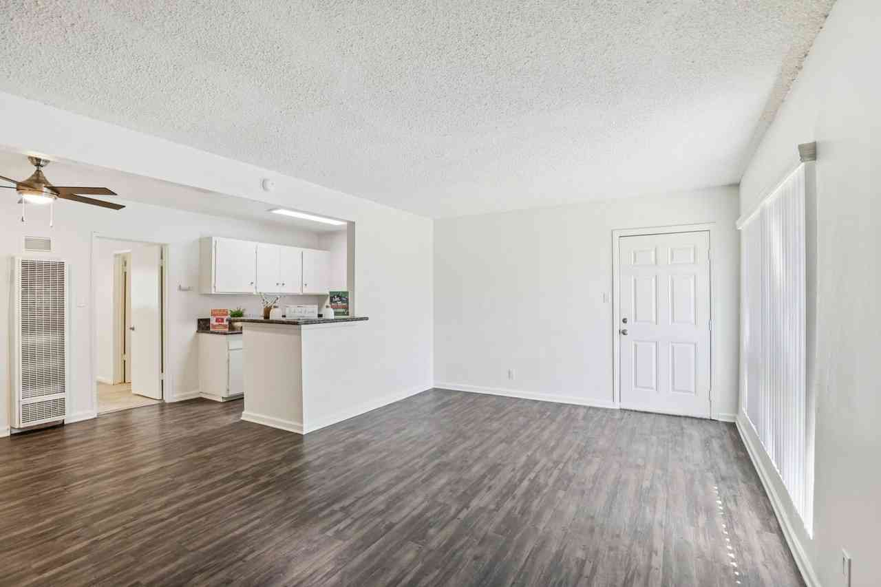 open concept living room and kitchen entry