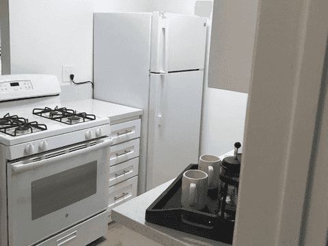 modern kitchen appliances and gas range